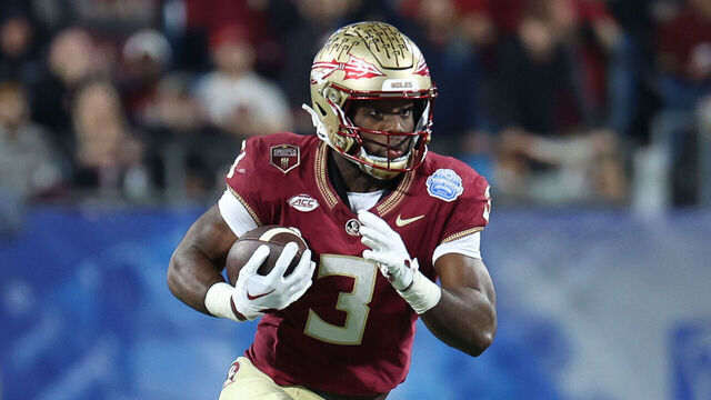 CHARLOTTE, NORTH CAROLINA - DECEMBER 2: Trey Benson #3 of the Florida State Seminoles runs the ball against the Louisville Cardinals during the ACC Championship at Bank of America Stadium on December 2, 2023 in Charlotte, North Carolina.