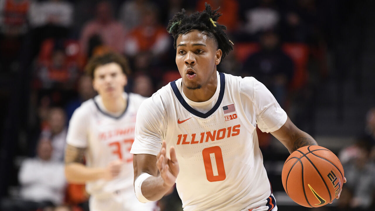 CHAMPAIGN, IL - DECEMBER 17: Illinois Fighting Illini Guard Terrence Shannon Jr. (0) advances the ball during the college basketball game between the Colgate Raiders and the Illinois Fighting Illini on December 17, 2023, at State Farm Center in Champaign, Illinois.