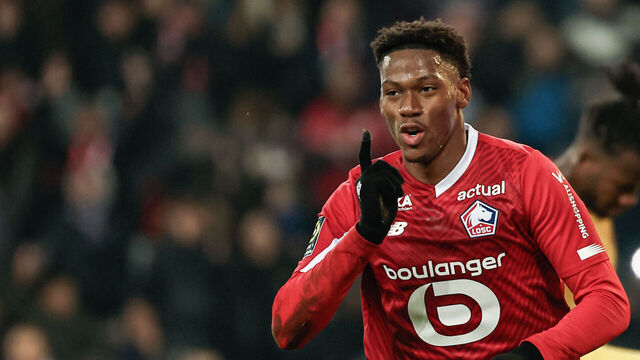 Lille's Canadian forward #09 Jonathan David (L) celebrates scoring his team's second goal during the French L1 football match between Lille LOSC and FC Metz at Stade Pierre-Mauroy in Villeneuve-d'Ascq, northern France on December 3, 2023.