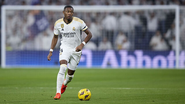 MADRID, SPAIN - DECEMBER 17: David Alaba of Real Madrid runs with the ball during the LaLiga EA Sports match between Real Madrid CF and Villarreal CF at Estadio Santiago Bernabeu on December 17, 2023 in Madrid, Spain.