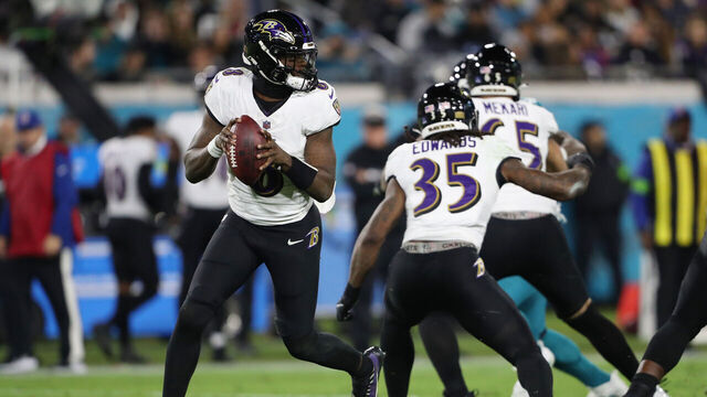 JACKSONVILLE, FLORIDA - DECEMBER 17: Lamar Jackson #8 of the Baltimore Ravens looks to pass against the Jacksonville Jaguars during the second quarter at EverBank Stadium on December 17, 2023 in Jacksonville, Florida.