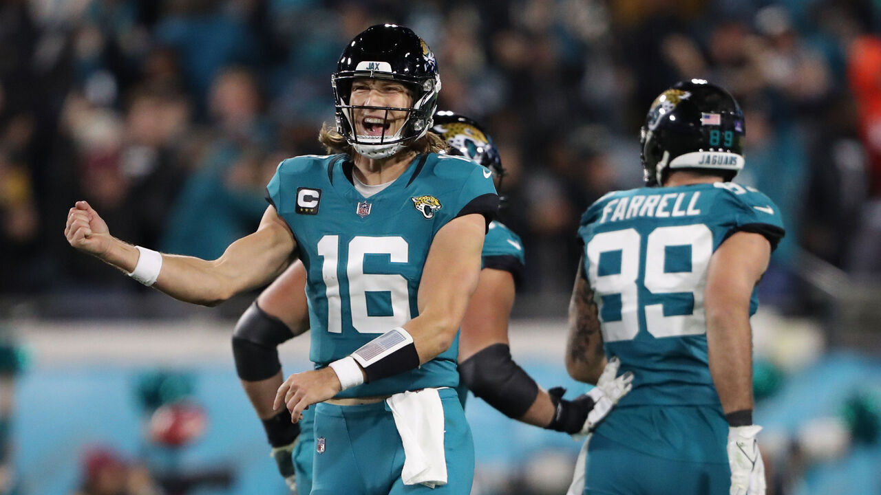 JACKSONVILLE, FLORIDA - DECEMBER 17: Trevor Lawrence #16 of the Jacksonville Jaguars celebrates after his touchdown pass against the Baltimore Ravens during the third quarter at EverBank Stadium on December 17, 2023 in Jacksonville, Florida.