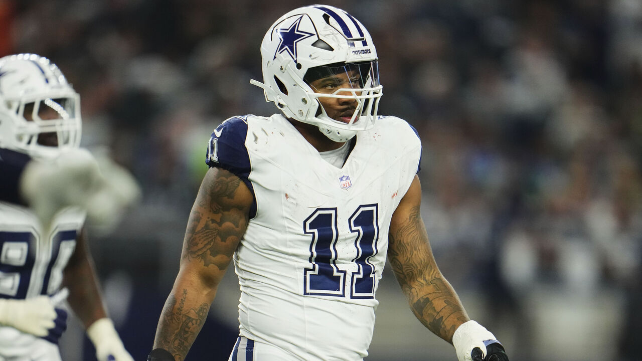 ARLINGTON, TX - DECEMBER 10: Micah Parsons #11 of the Dallas Cowboys walks on the field against the Philadelphia Eagles during the second half at AT&T Stadium on December 10, 2023 in Arlington, Texas.