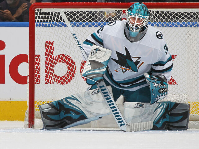 TORONTO, CANADA - NOVEMBER 30: Aaron Dell #30 of the San Jose Sharks watches a puck against the Toronto Maple Leafs during an NHL game at Scotiabank Arena on November 30, 2022 in Toronto, Ontario, Canada. The Maple Leafs defeated the Sharks 3-1.