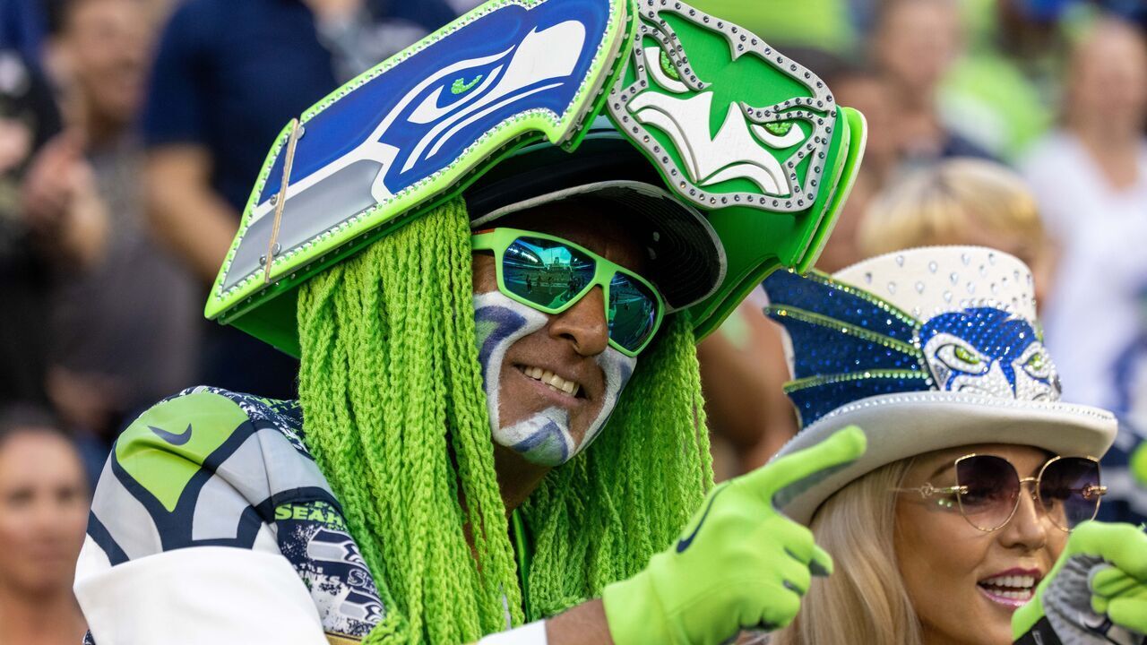 Seattle Seahawks fans cheer during an NFL preseason football game between the Seattle Seahawks and the Chicago Bears Thursday, Aug. 18, 2022, in Seattle.