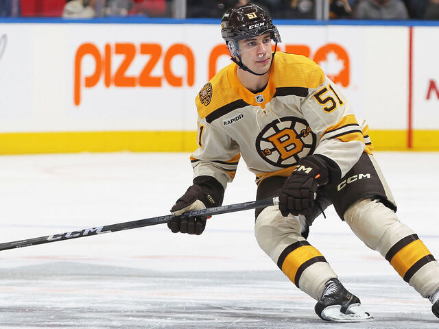 TORONTO, CANADA - DECEMBER 2: Matthew Poitras #51 of the Boston Bruins skates against the Toronto Maple Leafs during the first period in an NHL game at Scotiabank Arena on December 2, 2023 in Toronto, Ontario, Canada. The Bruins defeated the Maple Leafs 4-3 in overtime.