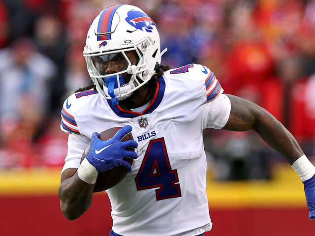 KANSAS CITY, MISSOURI - DECEMBER 10: Running back James Cook #4 of the Buffalo Bills carries the ball during the game against the Kansas City Chiefs at GEHA Field at Arrowhead Stadium on December 10, 2023 in Kansas City, Missouri.