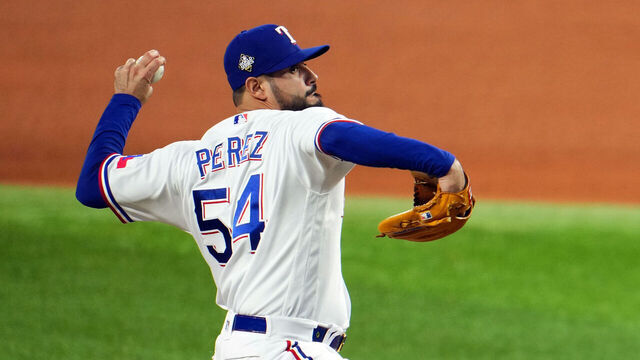 ARLINGTON, TX - OCTOBER 28: Martin Perez #54 of the Texas Rangers pitches in the eighth inning during Game 2 of the 2023 World Series between the Arizona Diamondbacks and the Texas Rangers at Globe Life Field on Saturday, October 28, 2023 in Arlington, Texas.