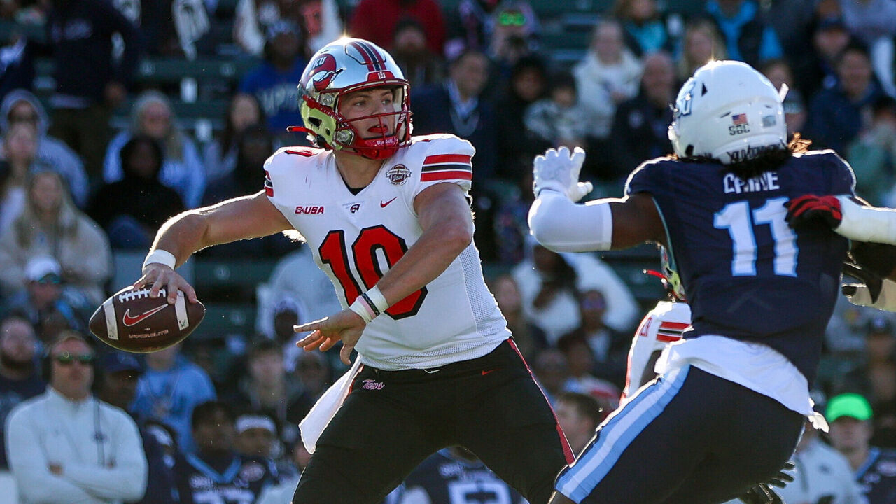 CHARLOTTE, NORTH CAROLINA - DECEMBER 18: Caden Veltkamp #10 of the Western Kentucky Hilltoppers throws the ball against the Old Dominion Monarchs during the first half of the Famous Toastery Bowl at Jerry Richardson Stadium on December 18, 2023 in Charlotte, North Carolina.