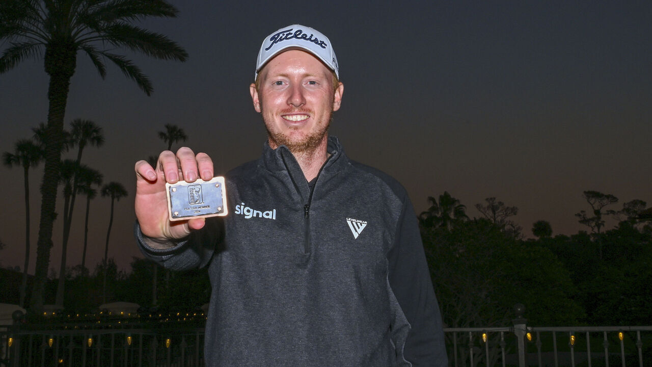 PONTE VEDRA BEACH, FLORIDA - DECEMBER 18: Hayden Springer poses with his PGA TOUR card after the rain-delayed final round of the PGA TOUR Q-School presented by Korn Ferry tournament on the Dye's Valley Golf Course at TPC Sawgrass on December 18, 2023 in Ponte Vedra Beach, Florida.