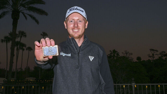 PONTE VEDRA BEACH, FLORIDA - DECEMBER 18: Hayden Springer poses with his PGA TOUR card after the rain-delayed final round of the PGA TOUR Q-School presented by Korn Ferry tournament on the Dye's Valley Golf Course at TPC Sawgrass on December 18, 2023 in Ponte Vedra Beach, Florida.