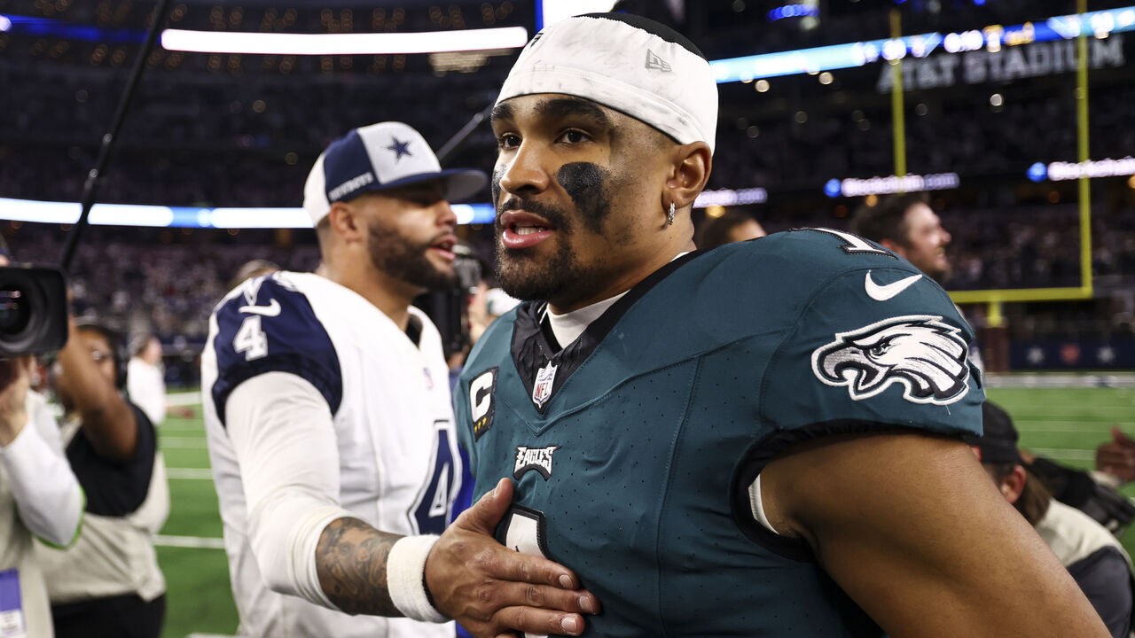 ARLINGTON, TX - DECEMBER 10: Jalen Hurts #1 of the Philadelphia Eagles walks away after talking with Dak Prescott #4 of the Dallas Cowboys after an NFL football game at AT&T Stadium on December 10, 2023 in Arlington, Texas.
