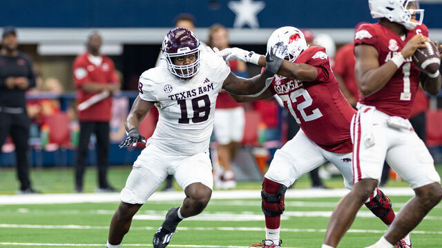 ARLINGTON, TX - SEPTEMBER 30: Texas A&M Aggies defensive lineman LT Overton (#18) rushes the passer during the Southwest Classic college football game between the Texas A&M Aggies and the Arkansas Razorbacks on September 30, 2023 at AT&T Stadium in Arlington, TX.