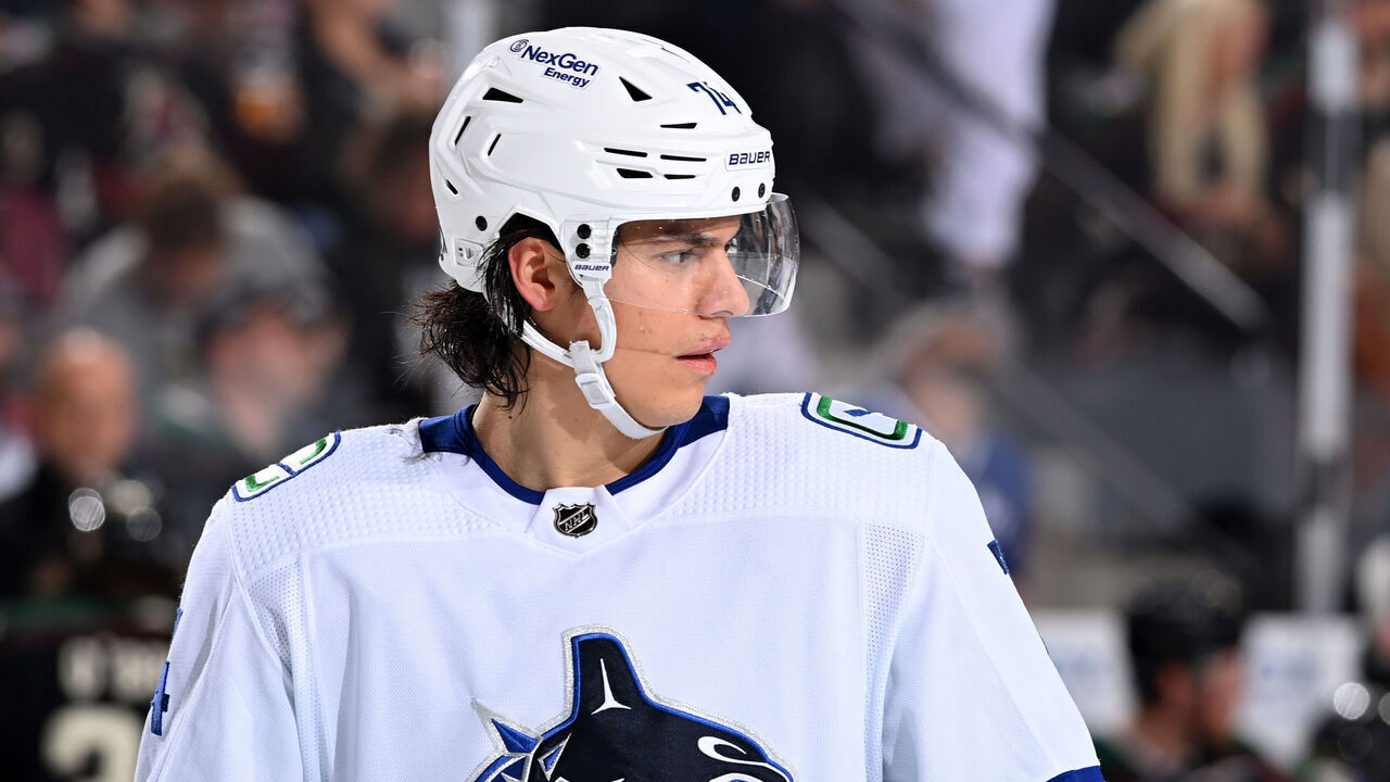 TEMPE, ARIZONA - APRIL 13: Ethan Bear #74 of the Vancouver Canucks looks up ice against the Arizona Coyotes at Mullett Arena on April 13, 2023 in Tempe, Arizona.