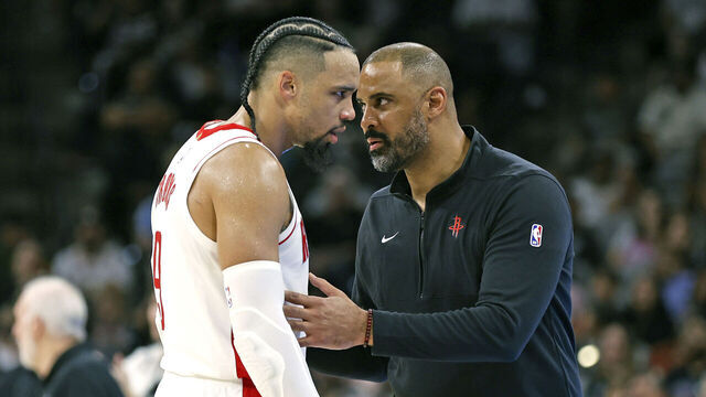 SAN ANTONIO, TX - OCTOBER 27: Ime Udoka head coach of the Houston Rockets confers with Dillon Brooks #9 in the second half at a NBA game at Frost Bank Center on October 27, 2023 in San Antonio, Texas. NOTE TO USER: User expressly acknowledges and agrees that, by downloading and or using this photograph, User is consenting to terms and conditions of the Getty Images License Agreement.