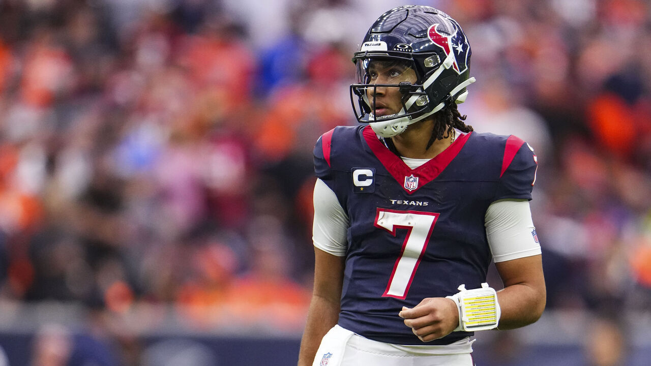 HOUSTON, TX - DECEMBER 03: C.J. Stroud #7 of the Houston Texans looks on from the field during an NFL football game against the Denver Broncos at NRG Stadium on December 3, 2023 in Houston, Texas.