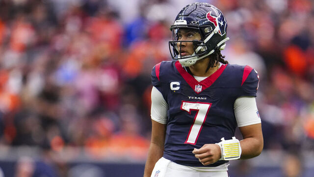 HOUSTON, TX - DECEMBER 03: C.J. Stroud #7 of the Houston Texans looks on from the field during an NFL football game against the Denver Broncos at NRG Stadium on December 3, 2023 in Houston, Texas.