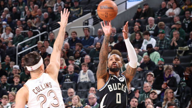 MILWAUKEE, WI - DECEMBER 19: Damian Lillard #0 of the Milwaukee Bucks shoots the ball during the game against the San Antonio Spurs on December 19, 2023 at the Fiserv Forum Center in Milwaukee, Wisconsin. Mandatory Copyright Notice: Copyright 2023 NBAE .