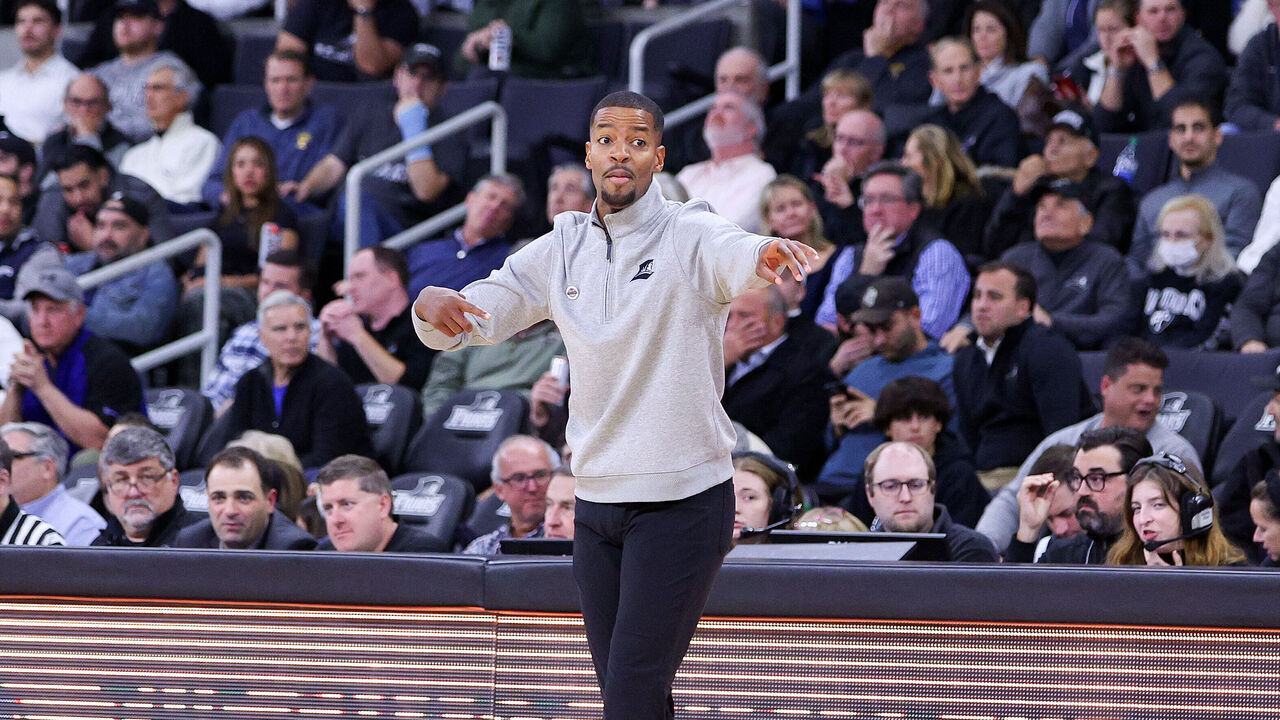 PROVIDENCE, RI - NOVEMBER 14: Providence Friars head coach Kim English reacts during a college basketball game between Wisconsin Badgers and Providence Friars on November 14, 2023, at Amica Mutual Pavilion in Providence, RI.