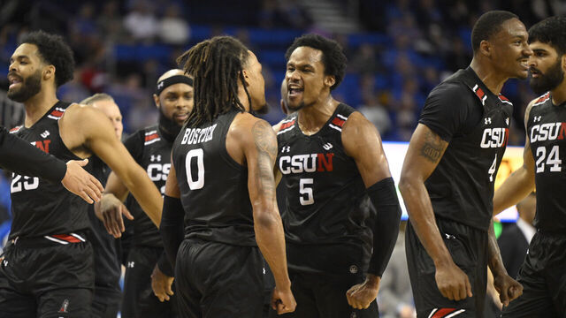 Los Angeles, CA - December 19: Gianni Hunt #5 of the Cal State Northridge Matadors reacted after a three pointer against the UCLA Bruins in the first half of a Men's NCAA basketball game at Pauley Pavilion in Los Angeles on Tuesday, December 19, 2023.