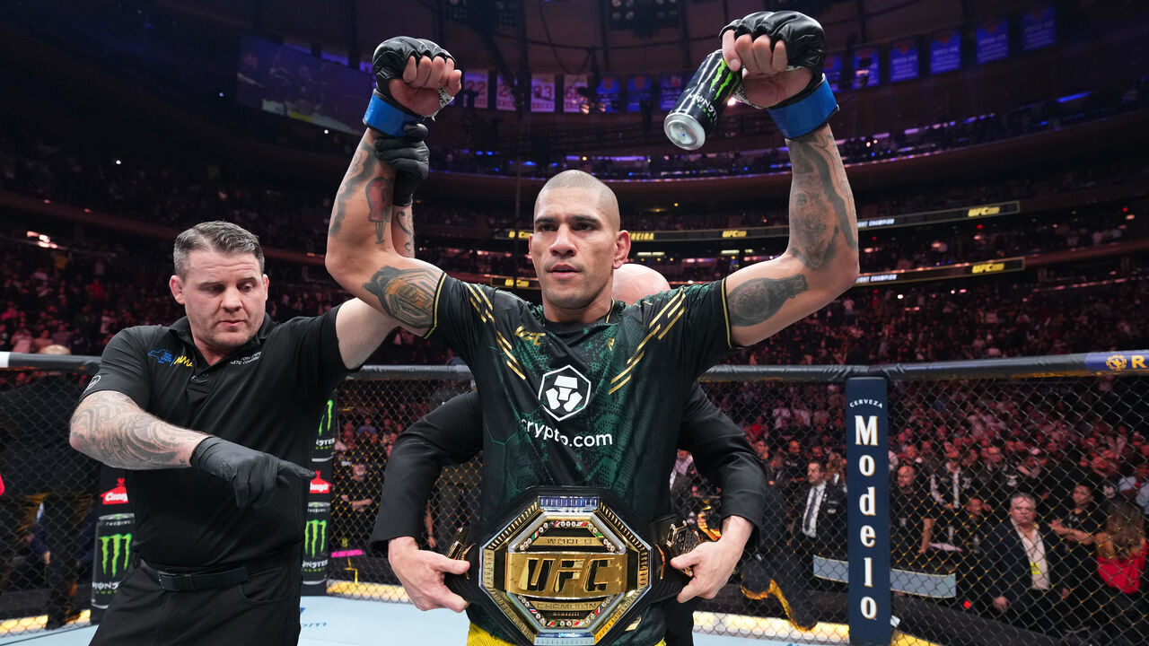 NEW YORK, NEW YORK - NOVEMBER 11: Alex Pereira of Brazil recieves the light heavyweight belt after defeating Jiri Prochazka of the Czech Republic by TKO in the UFC light heavyweight championship fight during the UFC 295 event at Madison Square Garden on November 11, 2023 in New York City.