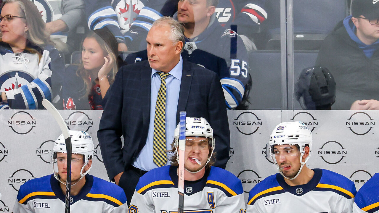 WINNIPEG, CANADA - OCTOBER 24: Head Coach Craig Berube of the St. Louis Blues looks on from the bench during third period action against the Winnipeg Jets at the Canada Life Centre on October 24, 2023 in Winnipeg, Manitoba, Canada.