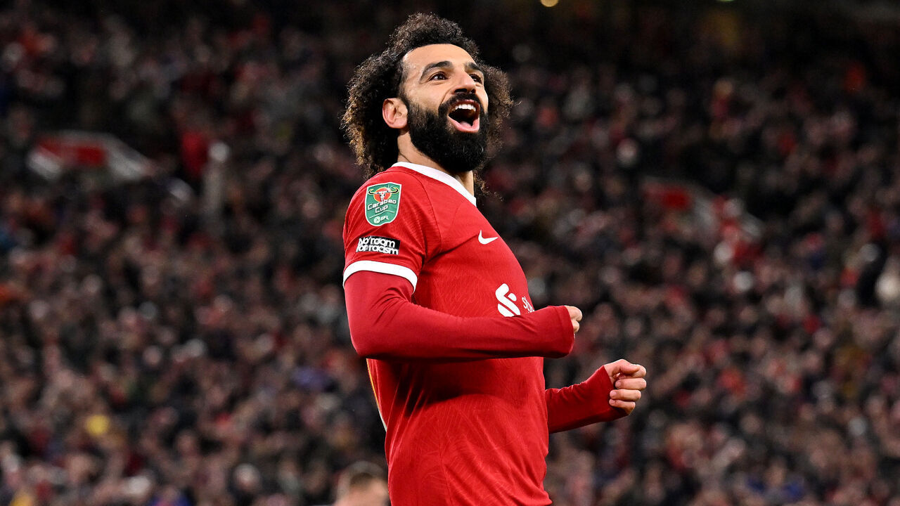 LIVERPOOL, ENGLAND - DECEMBER 20: (THE SUN OUT, THE SUN ON SUNDAY OUT) Mohamed Salah of Liverpool celebrates after scoring the fourth goal during the Carabao Cup Quarter Final match between Liverpool and West Ham United at Anfield on December 20, 2023 in Liverpool, England.