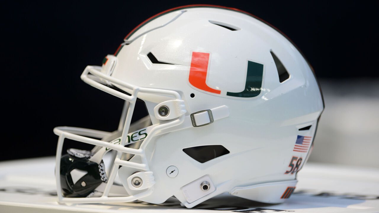 MIAMI GARDENS, FL - SEPTEMBER 10: A Miami Hurricanes helmet sits on the sidelines during during the college football game between the Southern Miss Golden Eagles and the University of Miami Hurricanes on September 10, 2022 at the Hard Rock Stadium in Miami Gardens, FL.