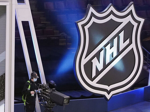 TORONTO, ONTARIO - JULY 29: A TV cameraman prepares to work the exhibition game between the Tampa Bay Lightning and the Florida Panthers before the 2020 NHL Stanley Cup Playoffs at Scotiabank Arena on July 29, 2020 in Toronto, Ontario, Canada.