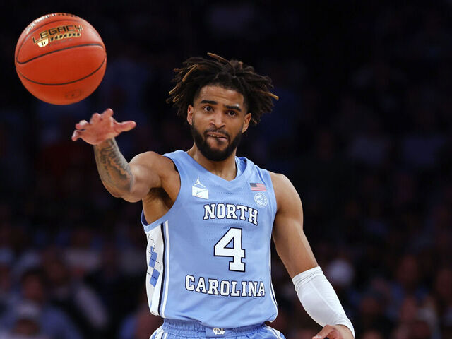 NEW YORK, NEW YORK - DECEMBER 5: RJ Davis #4 of the North Carolina Tar Heels in action against the Connecticut Huskies during a game in the Jimmy V Classic at Madison Square Garden on December 5, 2023 in New York City. Connecticut defeated North Carolina 87-76.