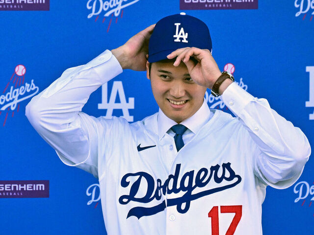 TOPSHOT - Japanese baseball player Shohei Ohtani attends a press conference on his presentation after signing a ten-year deal with the Los Angeles Dodgers at Dodgers Stadium in Los Angeles, California on December 14, 2023. Ohtani has signed a record-shattering $700 million deal with the Los Angeles Dodgers, the richest in North American sports history.
