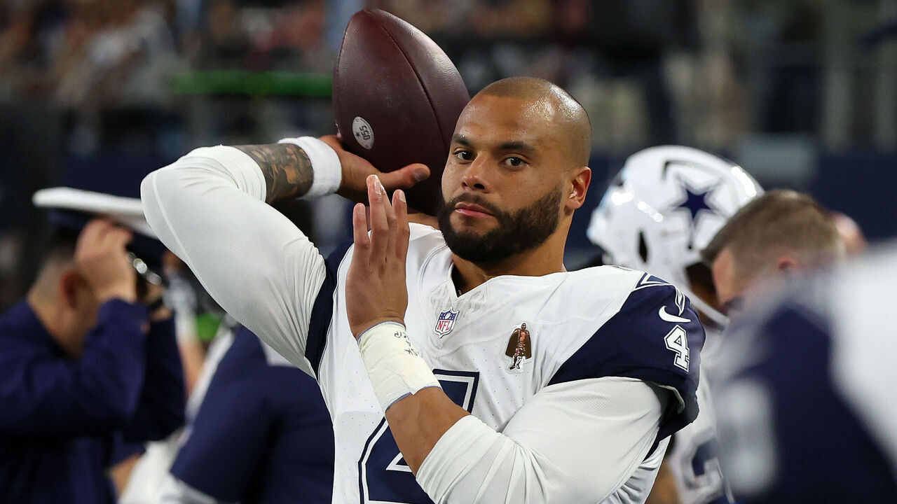 ARLINGTON, TEXAS - DECEMBER 10: Dak Prescott #4 of the Dallas Cowboys warms up on the sideline before the game against the Philadelphia Eagles at AT&T Stadium on December 10, 2023 in Arlington, Texas.
