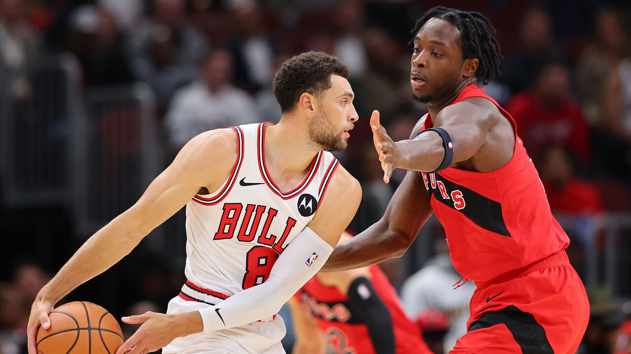 CHICAGO, ILLINOIS - OCTOBER 17: Zach LaVine #8 of the Chicago Bulls is defended by O.G. Anunoby #3 of the Toronto Raptors during the first half at the United Center on October 17, 2023 in Chicago, Illinois.
