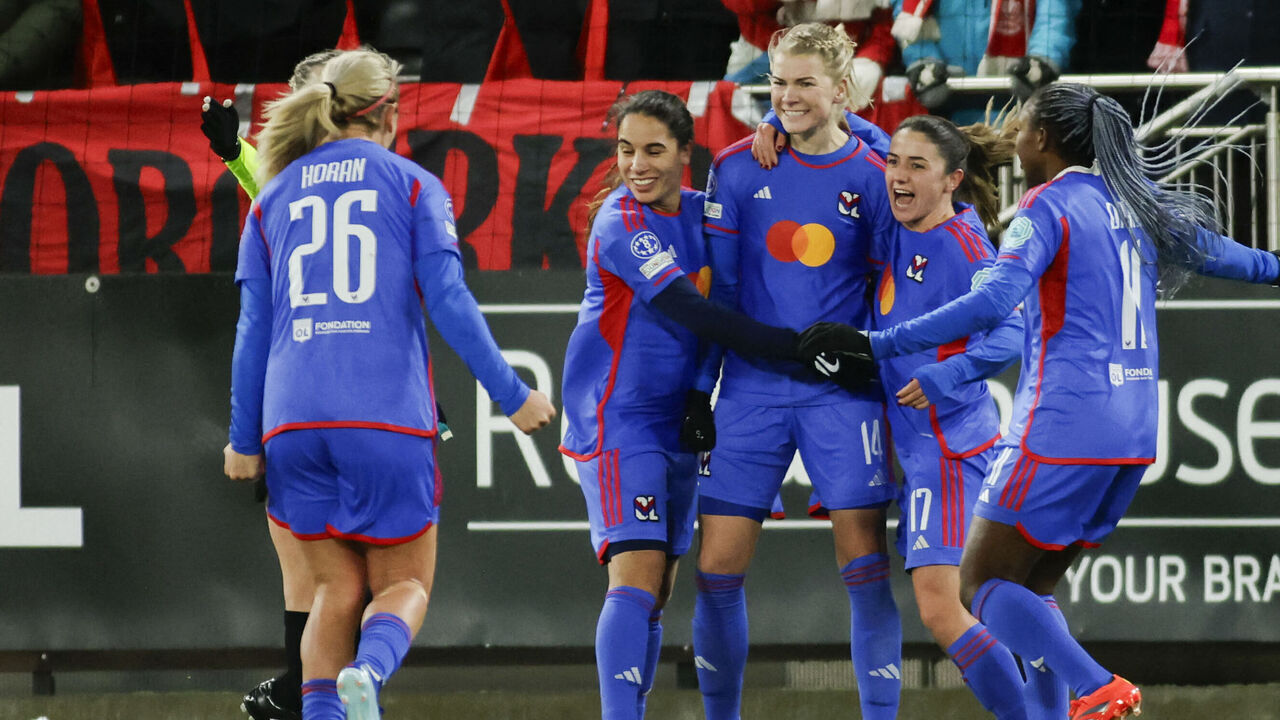 Lyon's Norwegian forward Ada Hegerberg celebrates with her teammates after she gave Lyon the 2-0 lead on penalties in the Champions League group stage match between Brann and Lyon in Bergen, Norway, on December 21, 2023.