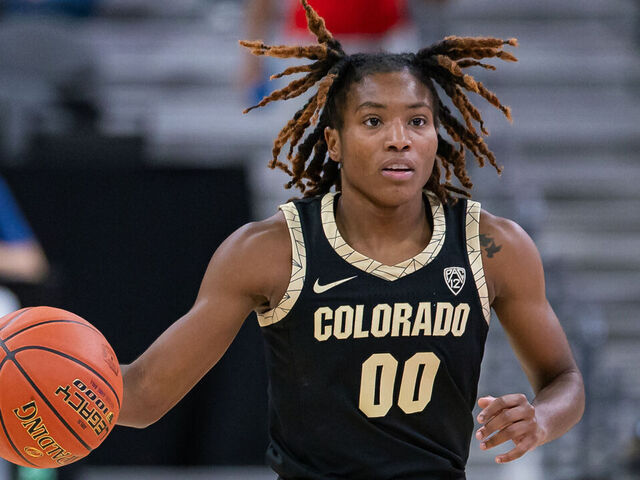LAS VEGAS, NEVADA - NOVEMBER 6: Jaylyn Sherrod #0 of the Colorado Buffaloes brings the ball up court during the game against the LSU Lady Tigers in the Naismith Hall of Fame Series at T-Mobile Arena on November 6, 2023 in Las Vegas, Nevada.