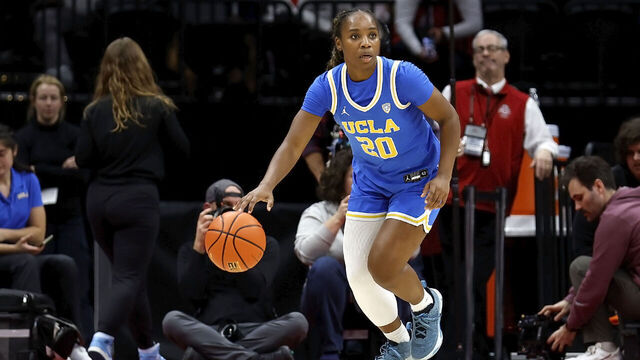 COLUMBUS, OHIO - DECEMBER 18: Charisma Osborne #20 of the UCLA Bruins controls the ball during the game against the Ohio State Buckeyes at Value City Arena on December 18, 2023 in Columbus, Ohio.