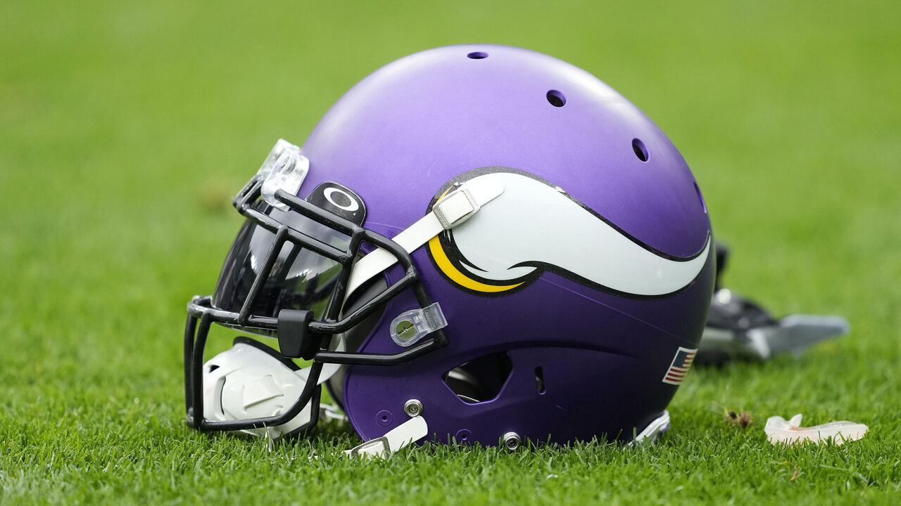 GREEN BAY, WISCONSIN - OCTOBER 29: A Minnesota Vikings helmet sits on the field before a game against the Green Bay Packers at Lambeau Field on October 29, 2023 in Green Bay, Wisconsin.