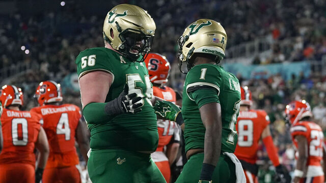 BOCA RATON, FLORIDA - DECEMBER 21: Khafre Brown #1 of the South Florida Bulls celebrates after scoring a touchdown against the Syracuse Orange during the second quarter in the RoofClaim.com Boca Raton Bowl game at FAU Stadium on December 21, 2023 in Boca Raton, Florida.
