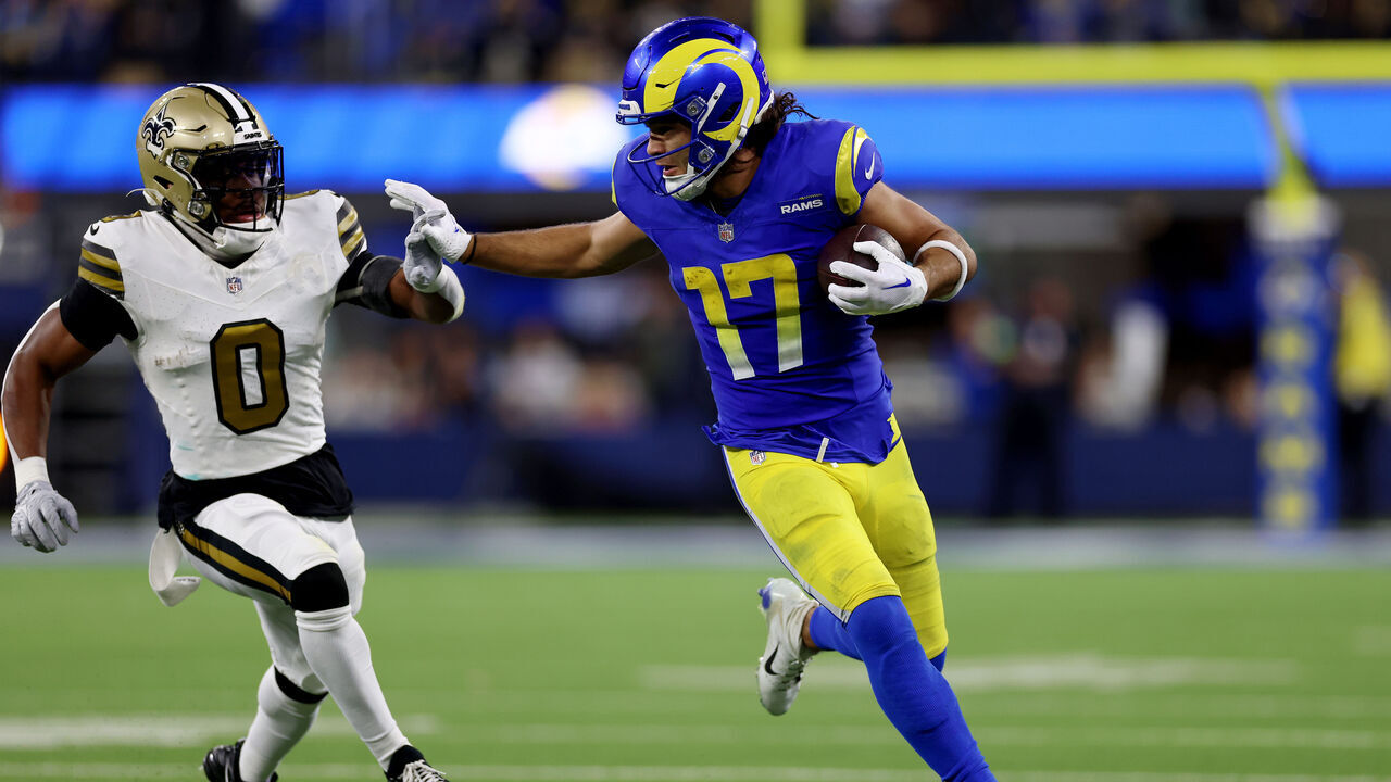 INGLEWOOD, CALIFORNIA - DECEMBER 21: Puka Nacua #17 of the Los Angeles Rams runs the ball against Ugo Amadi #0 of the New Orleans Saints during the fourth quarter at SoFi Stadium on December 21, 2023 in Inglewood, California.