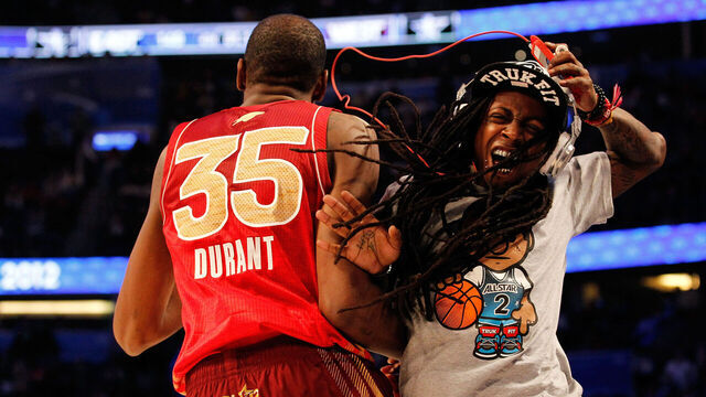 ORLANDO, FL - FEBRUARY 26: All-Star MVP Kevin Durant #35 of the Oklahoma City Thunder and the Western Conference celebrates with hip-hop artist Lil' Wayne during the 2012 NBA All-Star Game at the Amway Center on February 26, 2012 in Orlando, Florida.
