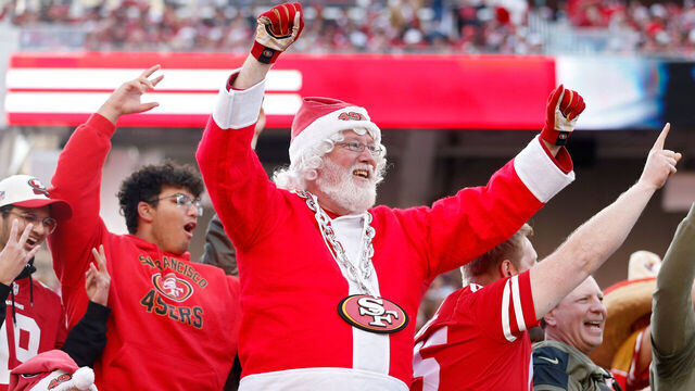SANTA CLARA, CALIFORNIA - DECEMBER 24: A fan dressed as Santa Claus in the stands during the second half of the game between the Washington Commanders and the San Francisco 49ers at Levi's Stadium on December 24, 2022 in Santa Clara, California.