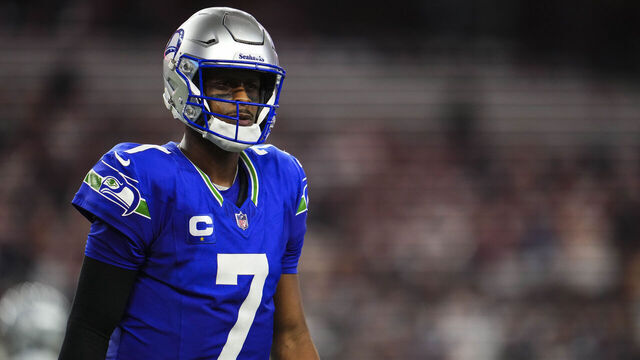 ARLINGTON, TX - NOVEMBER 30: Geno Smith #7 of the Seattle Seahawks looks on from the field during an NFL football game against the Dallas Cowboys at AT&T Stadium on November 30, 2023 in Arlington, Texas.
