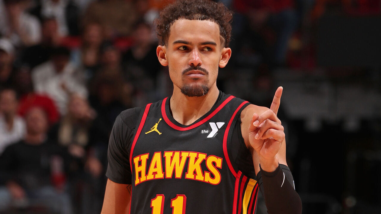 MIAMI, FL - DECEMBER 22: Trae Young #11 of the Atlanta Hawks celebrates during the game against the Miami Heat on December 22, 2023 at Kaseya Center in Miami, Florida. Mandatory Copyright Notice: Copyright 2023 NBAE