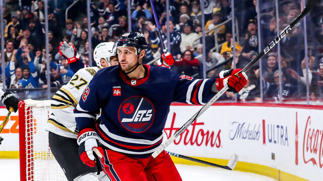 WINNIPEG, CANADA - DECEMBER 22: Nino Niederreiter #62 of the Winnipeg Jets celebrates after scoring a second period goal against the Boston Bruins at the Canada Life Centre on December 22, 2023 in Winnipeg, Manitoba, Canada.
