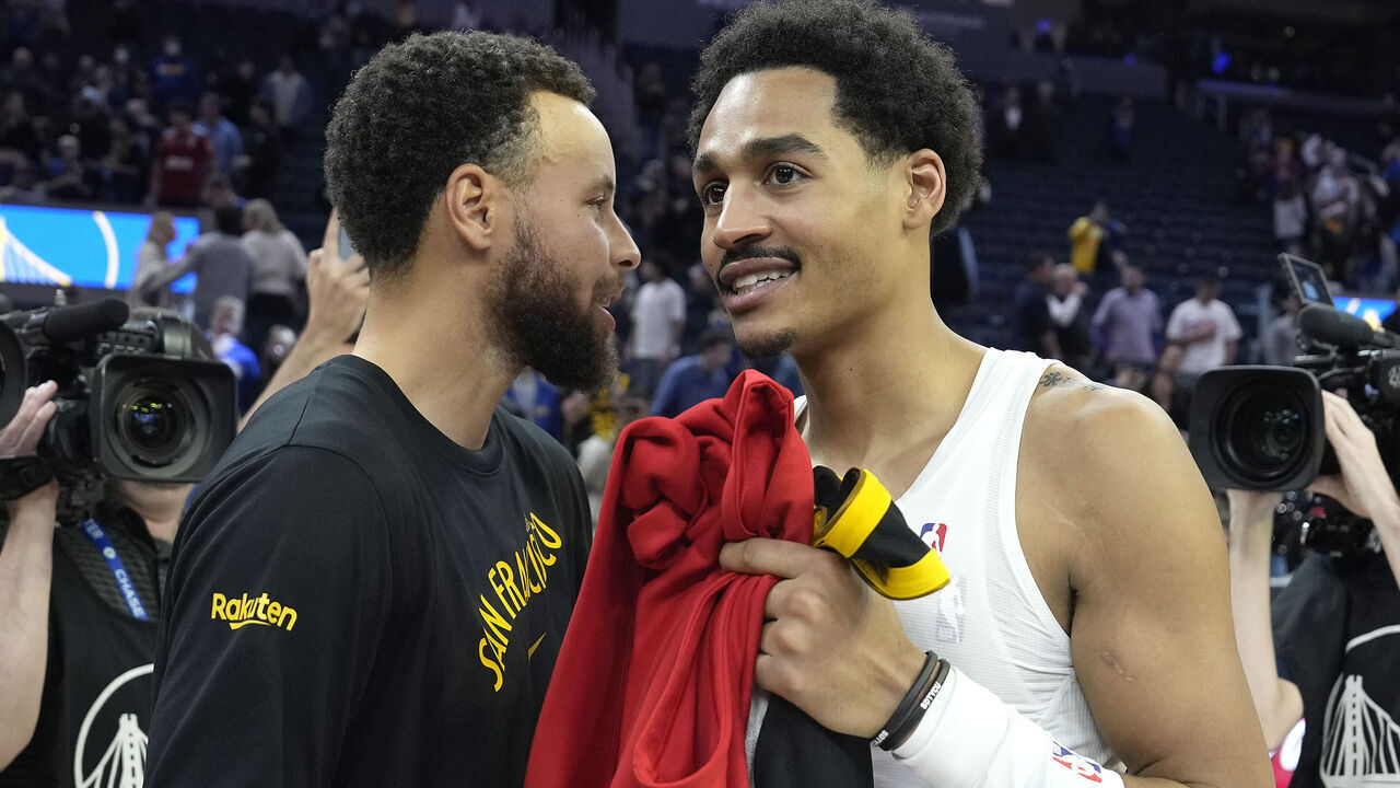 SAN FRANCISCO, CALIFORNIA - DECEMBER 22: Jordan Poole #13 of the Washington Wizards (R) and Stephen Curry #30 of the Golden State Warriors (L) gets together on the court after their game at Chase Center on December 22, 2023 in San Francisco, California.