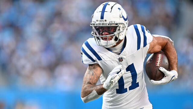 CHARLOTTE, NORTH CAROLINA - NOVEMBER 05: Michael Pittman Jr. #11 of the Indianapolis Colts runs after a catch against the Carolina Panthers during the game at Bank of America Stadium on November 05, 2023 in Charlotte, North Carolina.