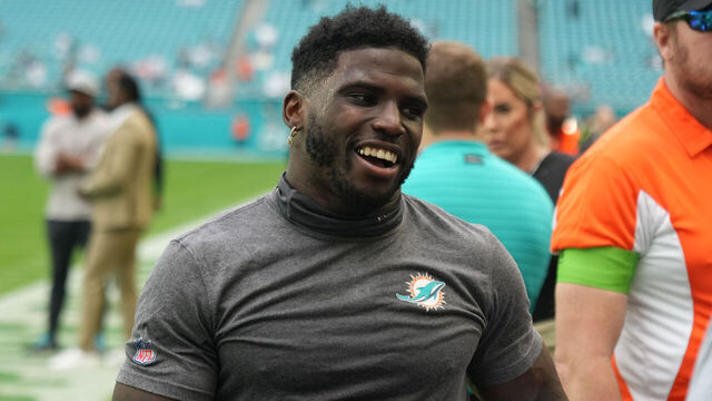 MIAMI GARDENS, FL - DECEMBER 17: Miami Dolphins wide receiver Tyreek Hill (10) talks with a fan before the game between the New York Jets and the Miami Dolphins on Sunday, December 17, 2023 at Hard Rock Stadium, Hard Rock Stadium, Fla.