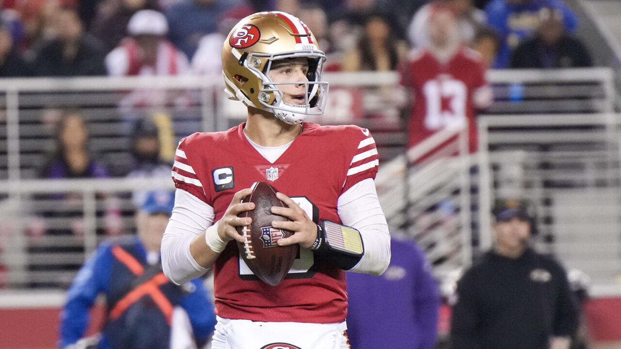 SANTA CLARA, CALIFORNIA - DECEMBER 25: Brock Purdy #13 of the San Francisco 49ers attempts a pass against the Baltimore Ravens during the third quarter at Levi's Stadium on December 25, 2023 in Santa Clara, California.