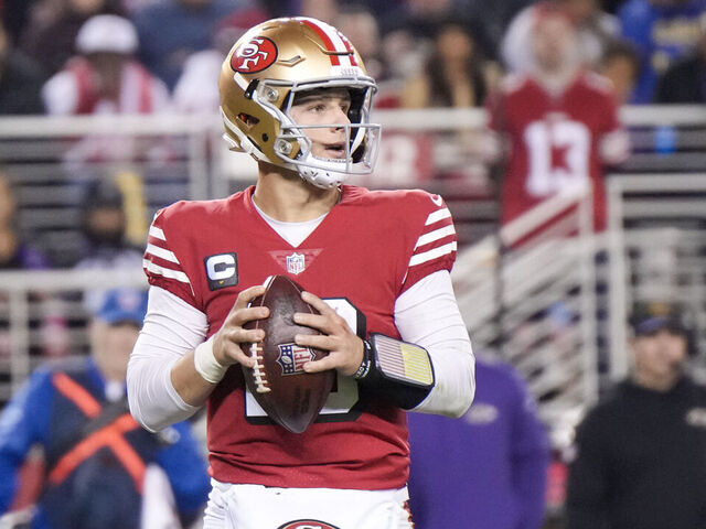 SANTA CLARA, CALIFORNIA - DECEMBER 25: Brock Purdy #13 of the San Francisco 49ers attempts a pass against the Baltimore Ravens during the third quarter at Levi's Stadium on December 25, 2023 in Santa Clara, California.