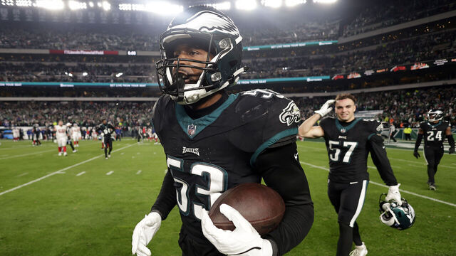 PHILADELPHIA, PENNSYLVANIA - DECEMBER 25: Shaquille Leonard #53 of the Philadelphia Eagles walks away with the ball after the 33-25 win against the New York Giants at Lincoln Financial Field on December 25, 2023 in Philadelphia, Pennsylvania.